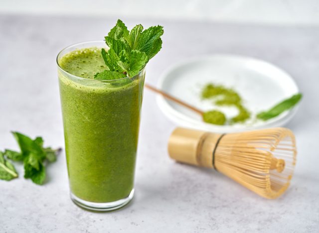 mint matcha smoothie garnished with mint