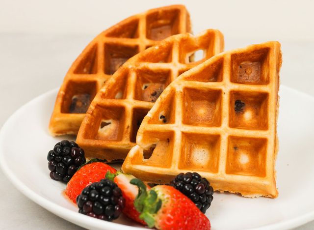 protein waffles on a plate with fresh berries