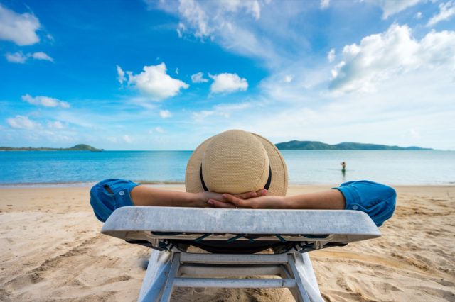Woman Relaxing On Beach Ocean View Vacation Outdoor Seascape