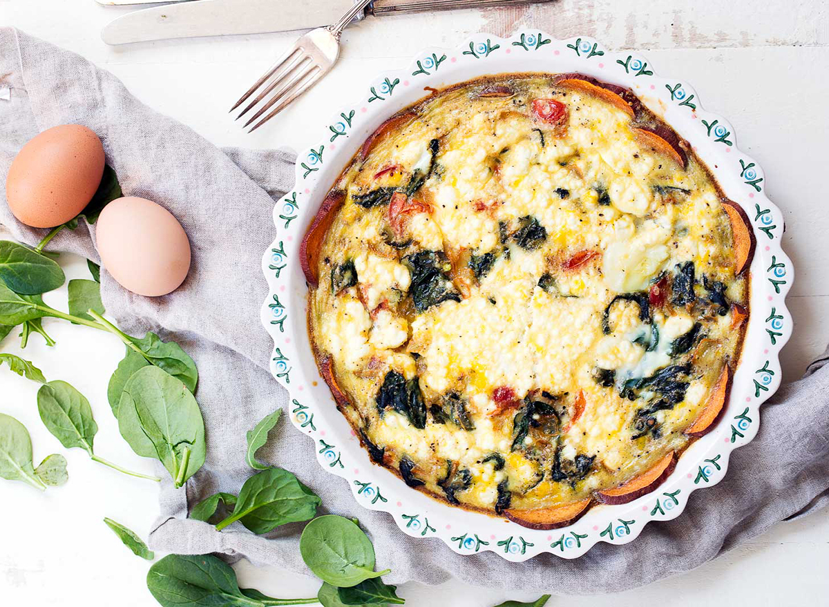 spinach and goat cheese quiche in baking dish