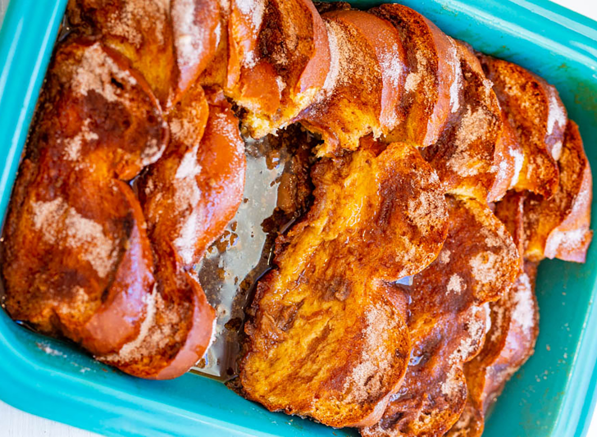 french toast slices in baking dish with syrup