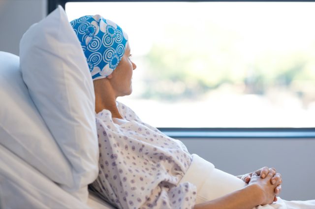 Concerned Cancer Patient in bed awaiting treatment