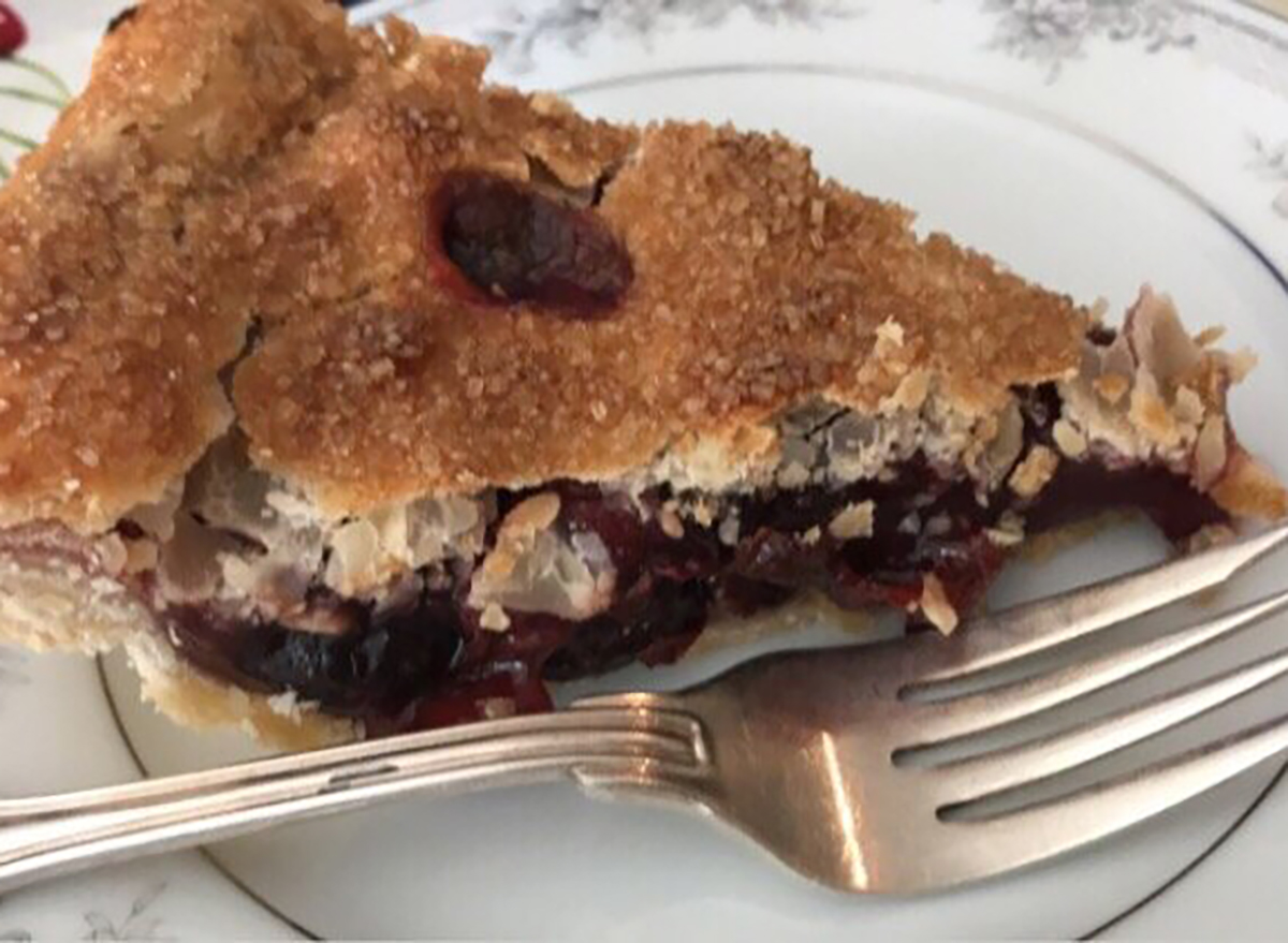 cherry pie slice with fork