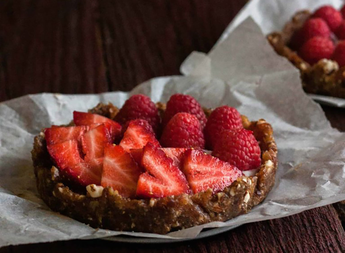 coconut cream fruit tart with strawberry slices