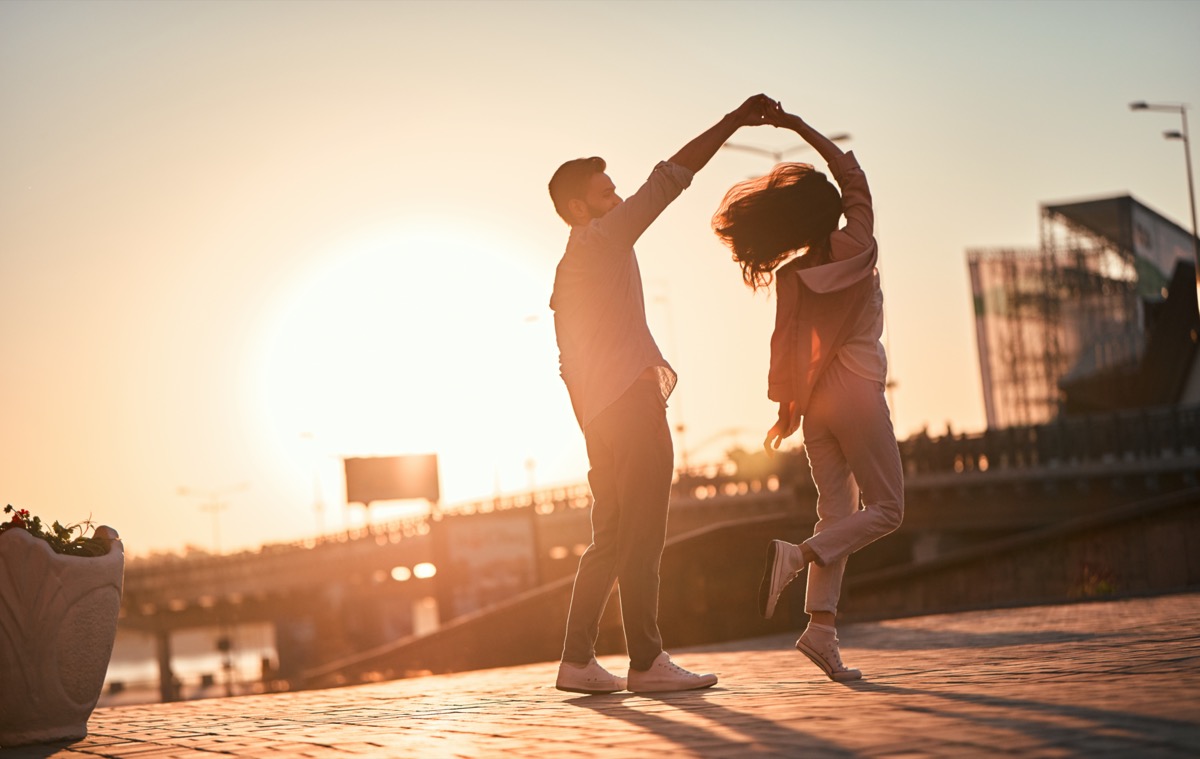 Love is in the air! Cute romantic couple spending time together in the city