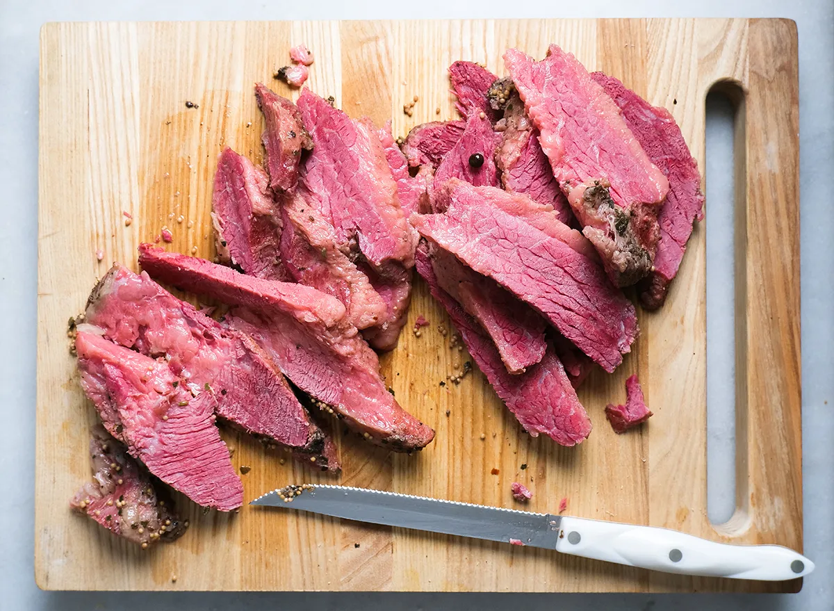 sliced corned beef on a cutting board