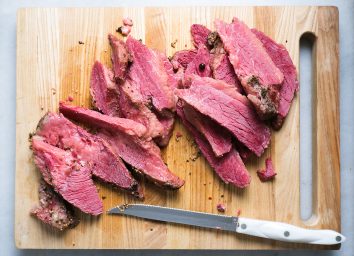 sliced corned beef on a cutting board