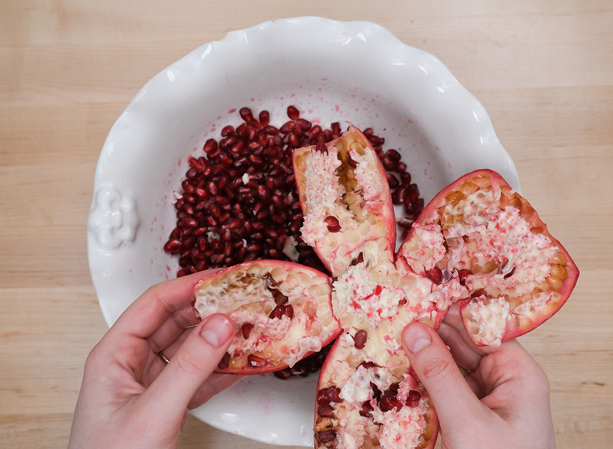 empty pomegranate skin with seeds in a bowl
