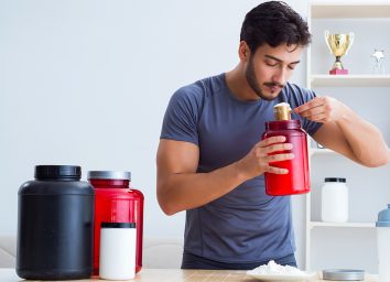 man using protein powder