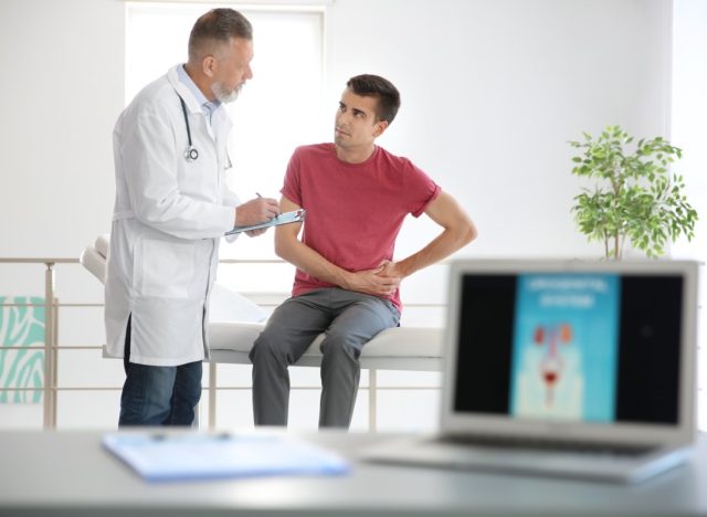 Man with health problem visiting urologist at hospital
