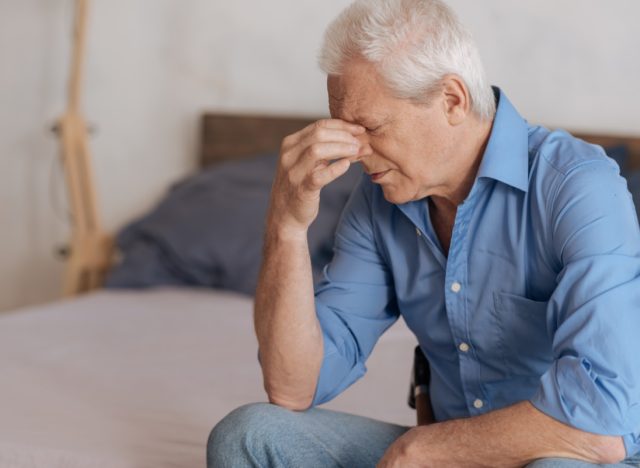 Moody aged man feeling unhappy.