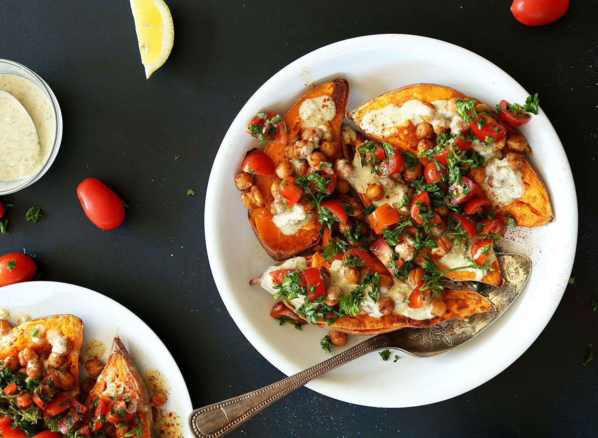 mediterranean baked sweet potatoes with tomato and cheese