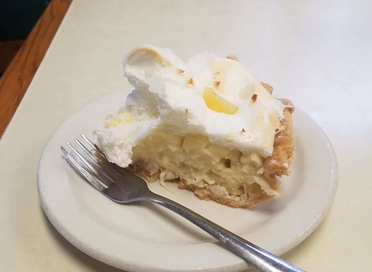 pineapple coconut pie slice on plate