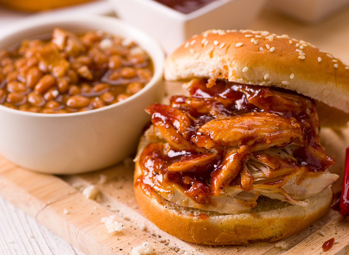 pulled chicken sandwich with baked beans