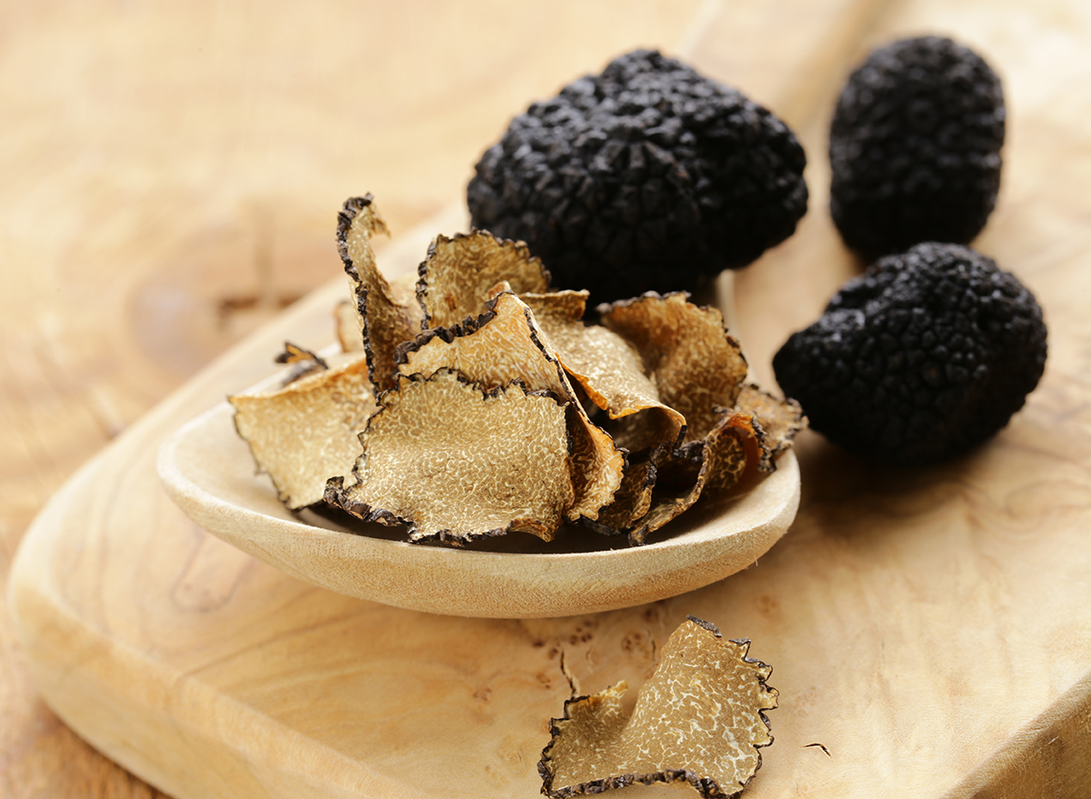 sliced truffle mushrooms on cutting board