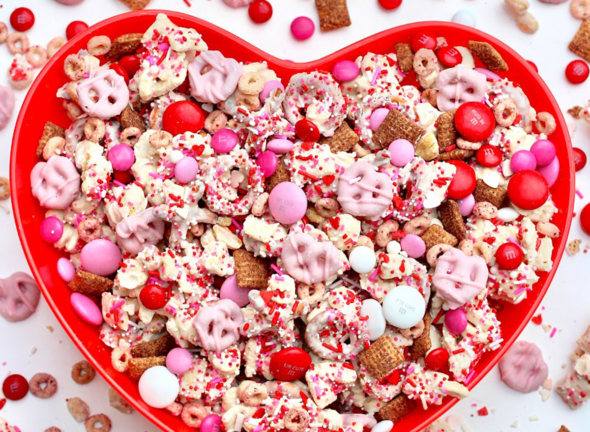 valentine's sweetheart snack mix with chocolate candy and pink pretzels