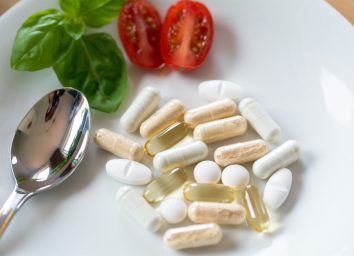 Dietary supplements, vitamins, plate