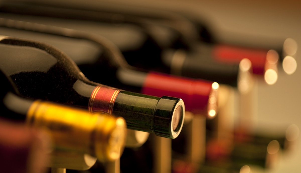 red wine bottles in a wine cellar