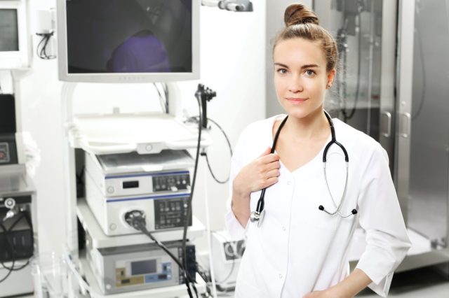 Gastrologist.  The doctor's office.  Gastroenterologist doctor with probe to perform gastroscopy and colonoscopy