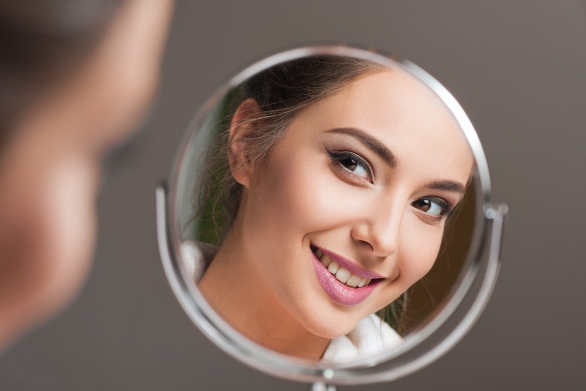 Portrait of a young brunette cosmetics beauty
