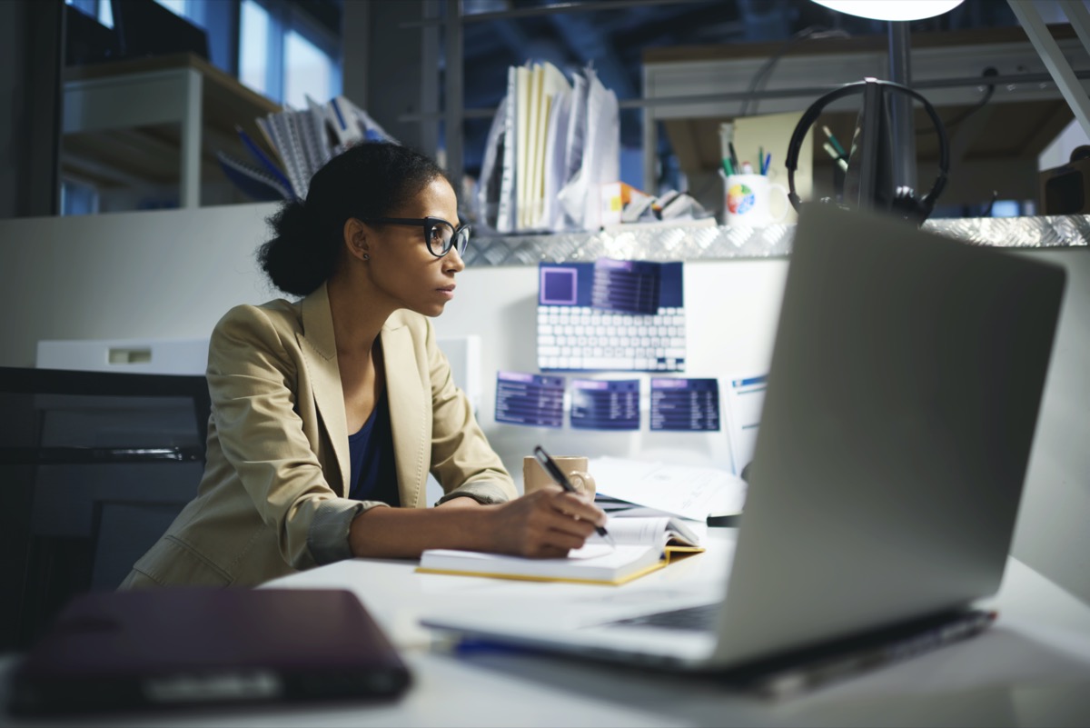 Woman working late