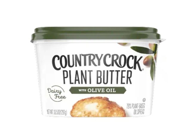 container of butter substitute on a white background