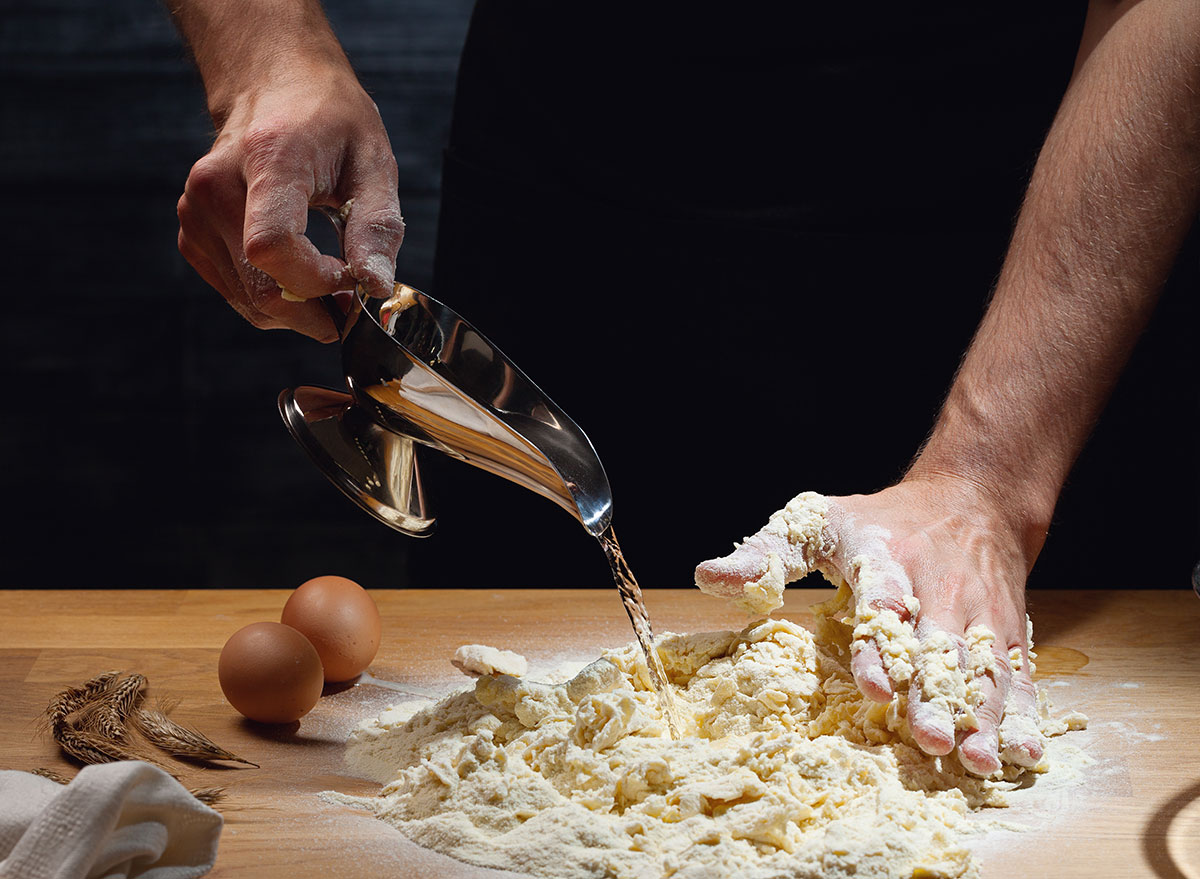 Adding water to dough