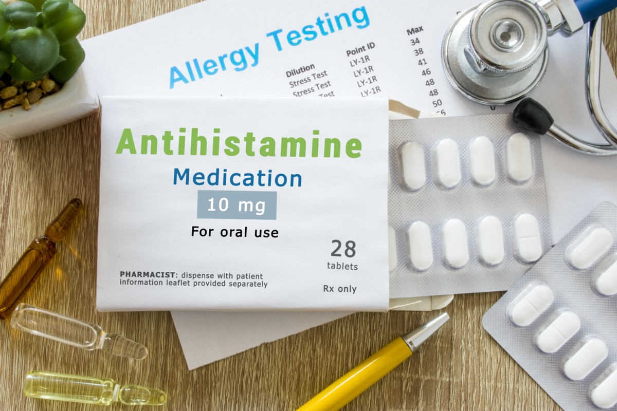 Antihistamine medication or allergy drug. on the table.
