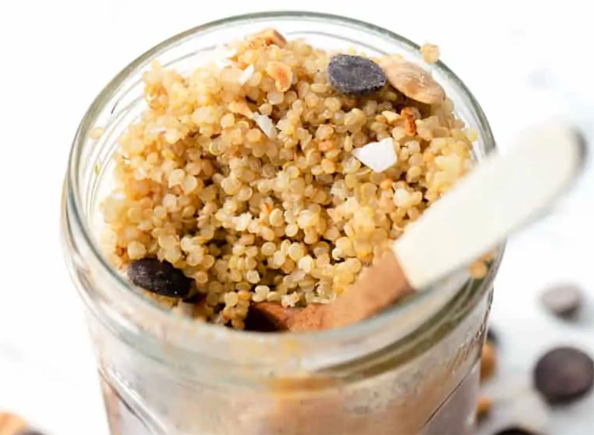chocolate peanut butter breakfast parfait in mason jar with chocolate chips