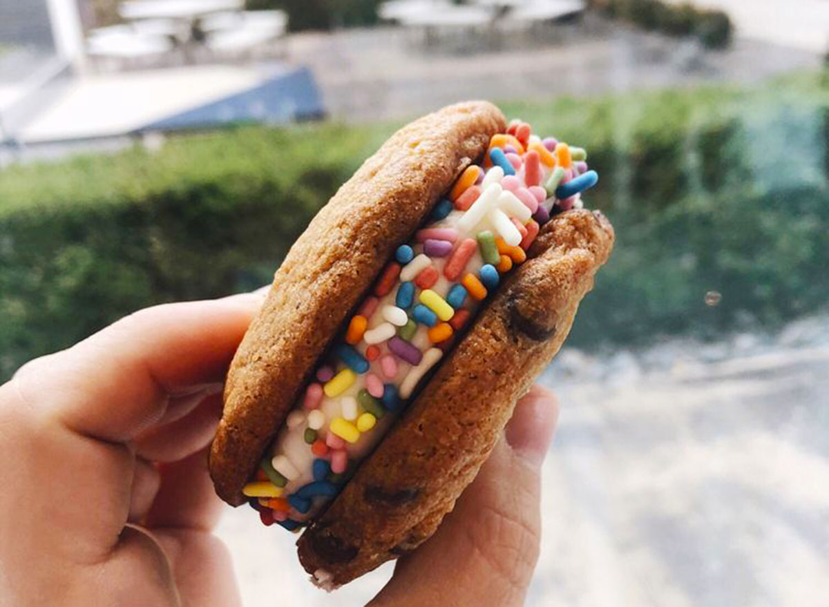 cookie sandwich with vanilla icing and sprinkles