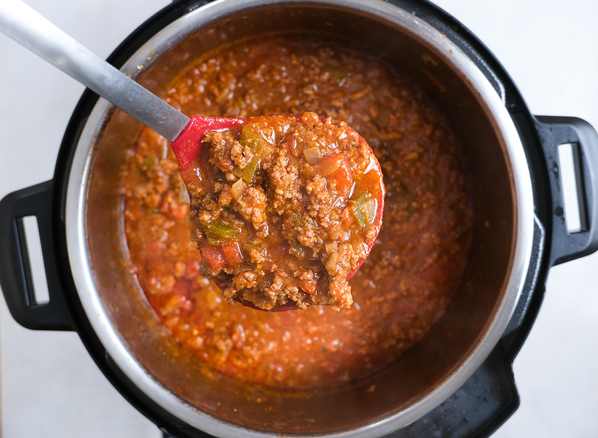 ladle full of chili from an Instant Pot