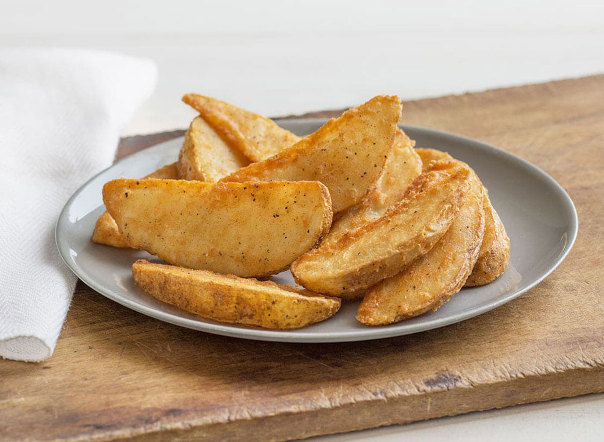 batata cunhas kfc na placa de
