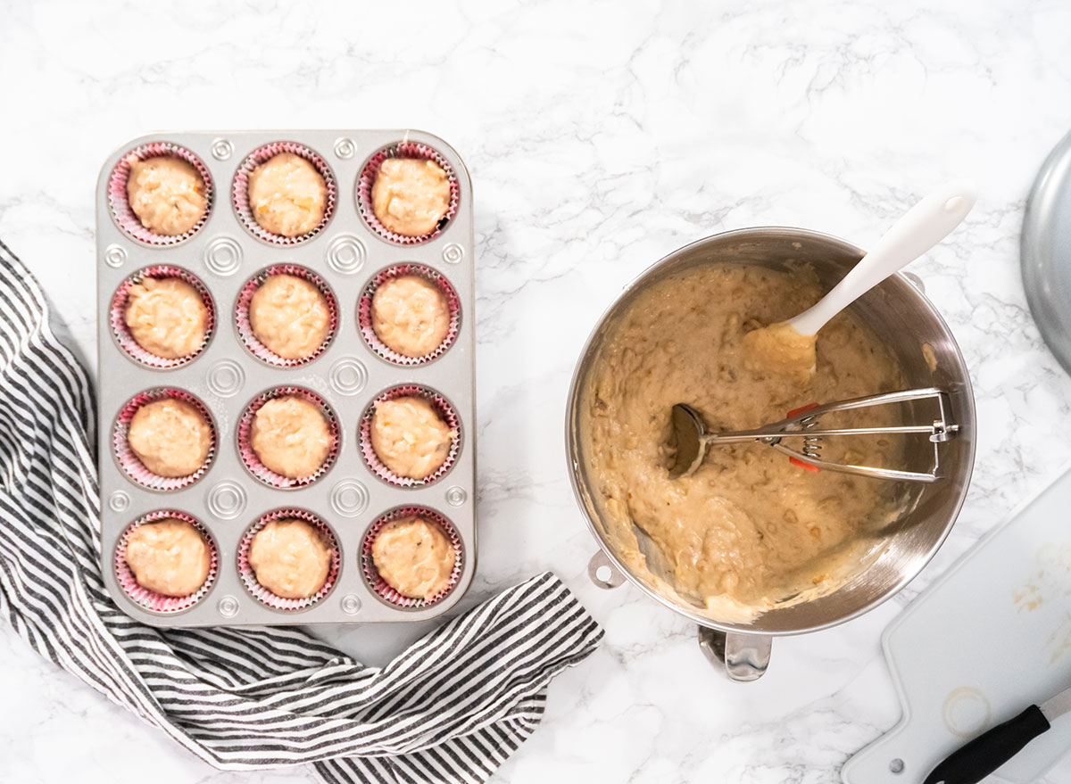 bowl of batter with muffin tin