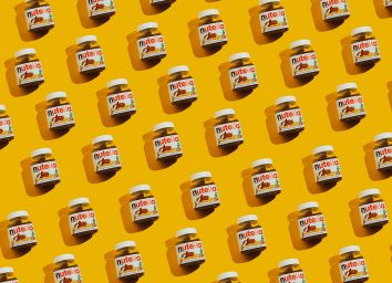 nutella jars with yellow background