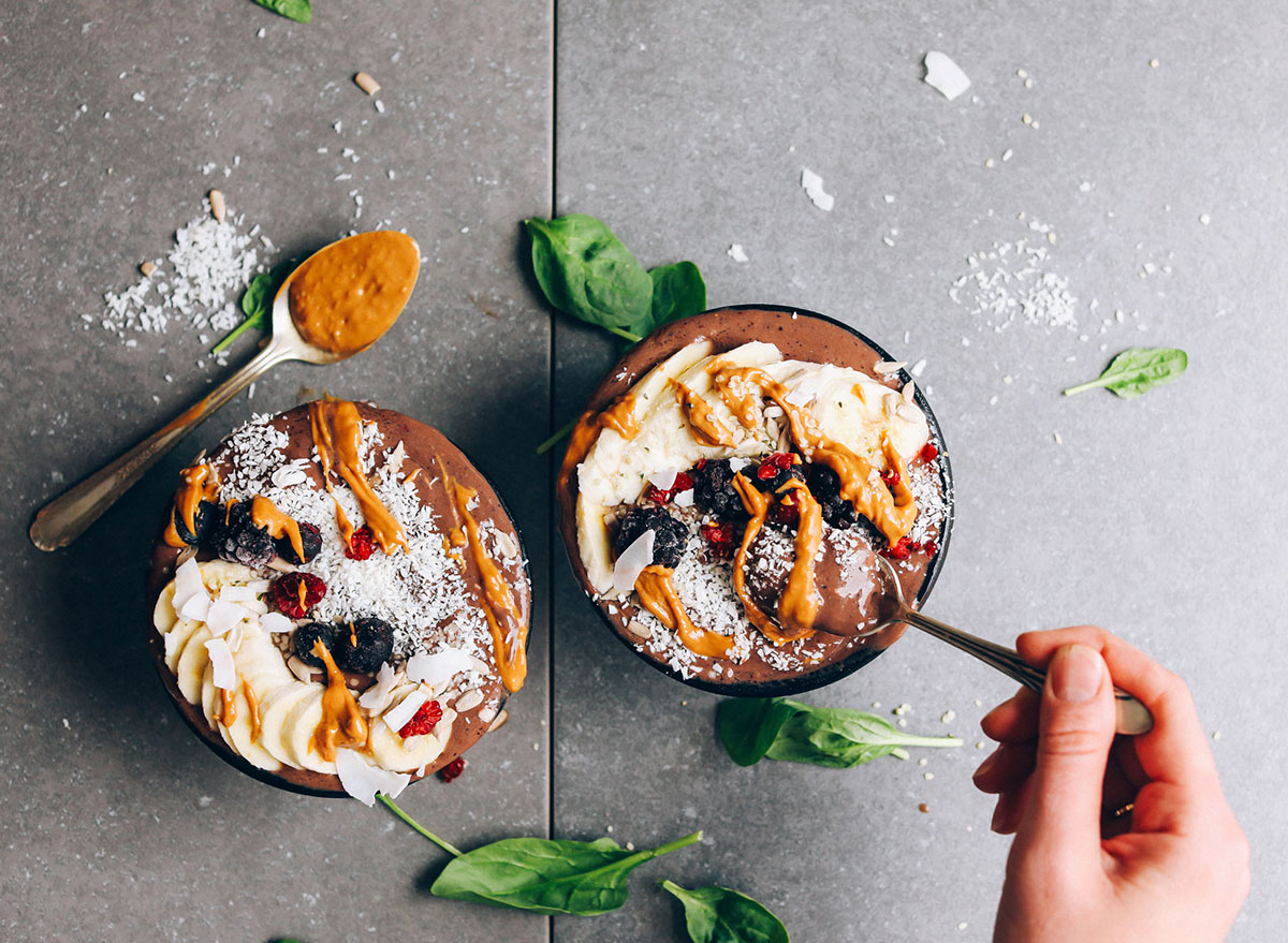 peanut butter and jelly acai bowls topped with berries banana coconut