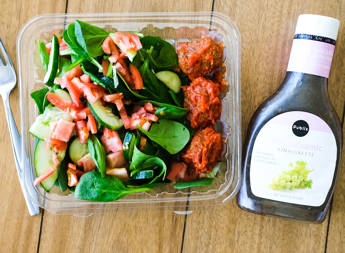 meatballs with a side salad and dressing from publix