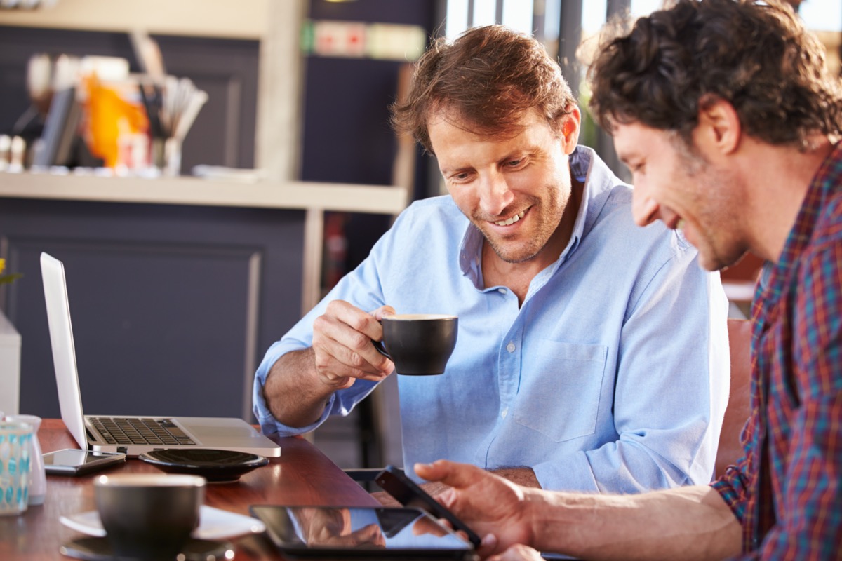 Two men meeting at a coffee shop