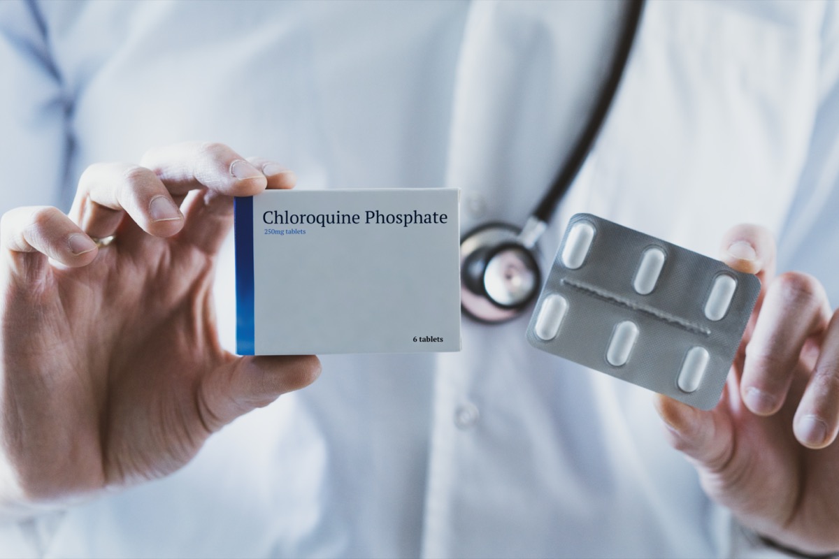 Doctor holding Chloroquine Phosphate drug