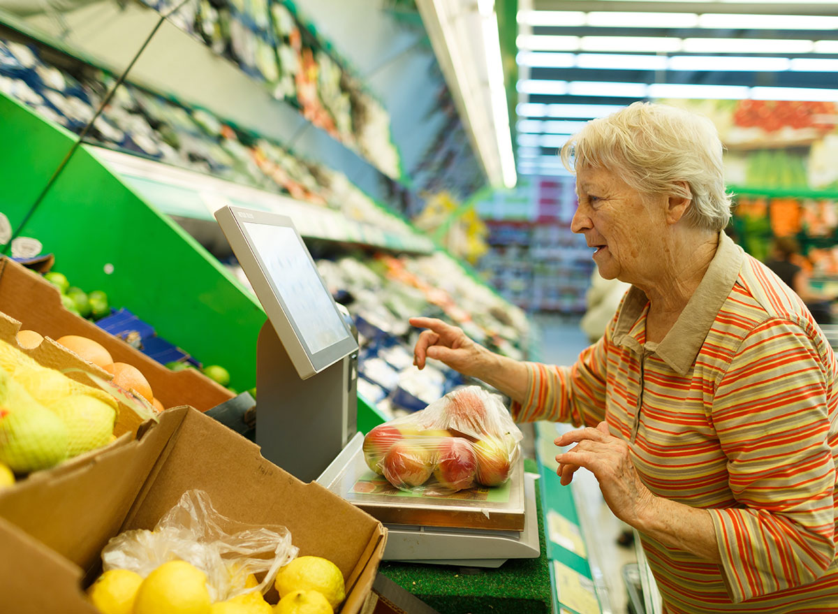 elderly woman grocery shopping