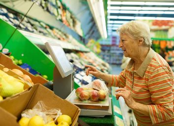 elderly woman grocery shopping