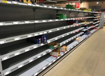 Empty shelves in supermarket