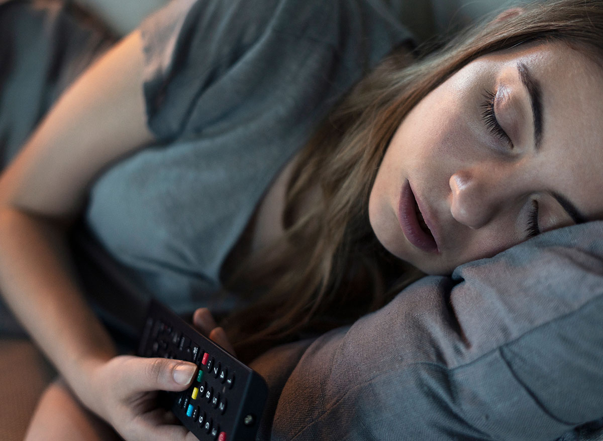 girl sleeping tv