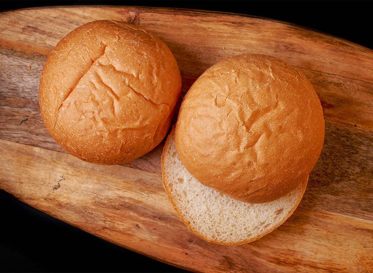 hamburger buns on wooden board