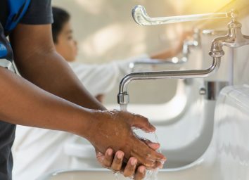 Man washing hands.
