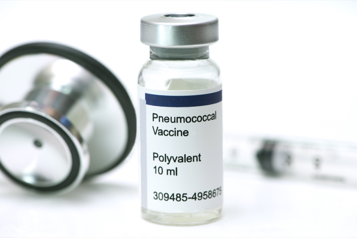 Pneumococcal Pneumonia vaccine with syringe and stethoscope