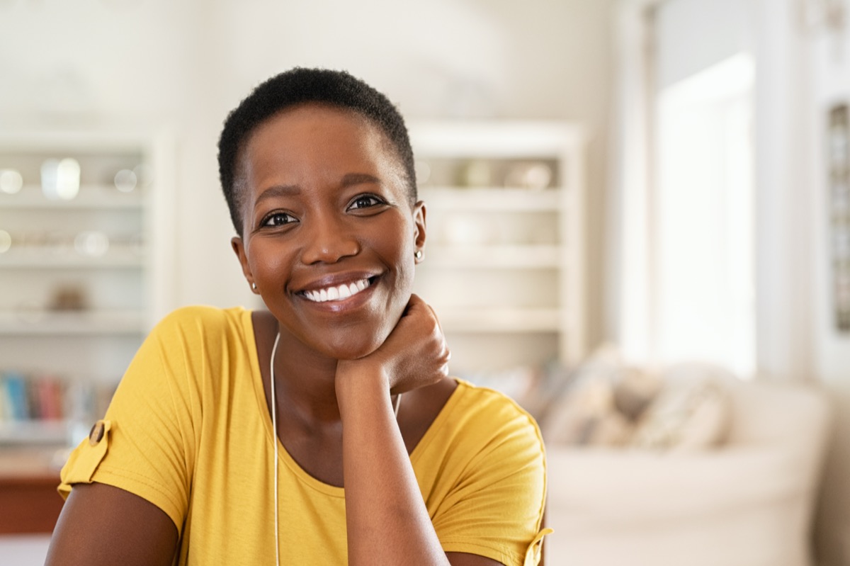 Smiling woman kitchen home