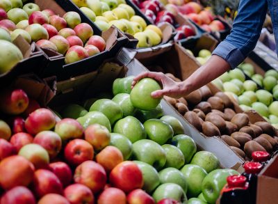 woman apple shopping in grocery store