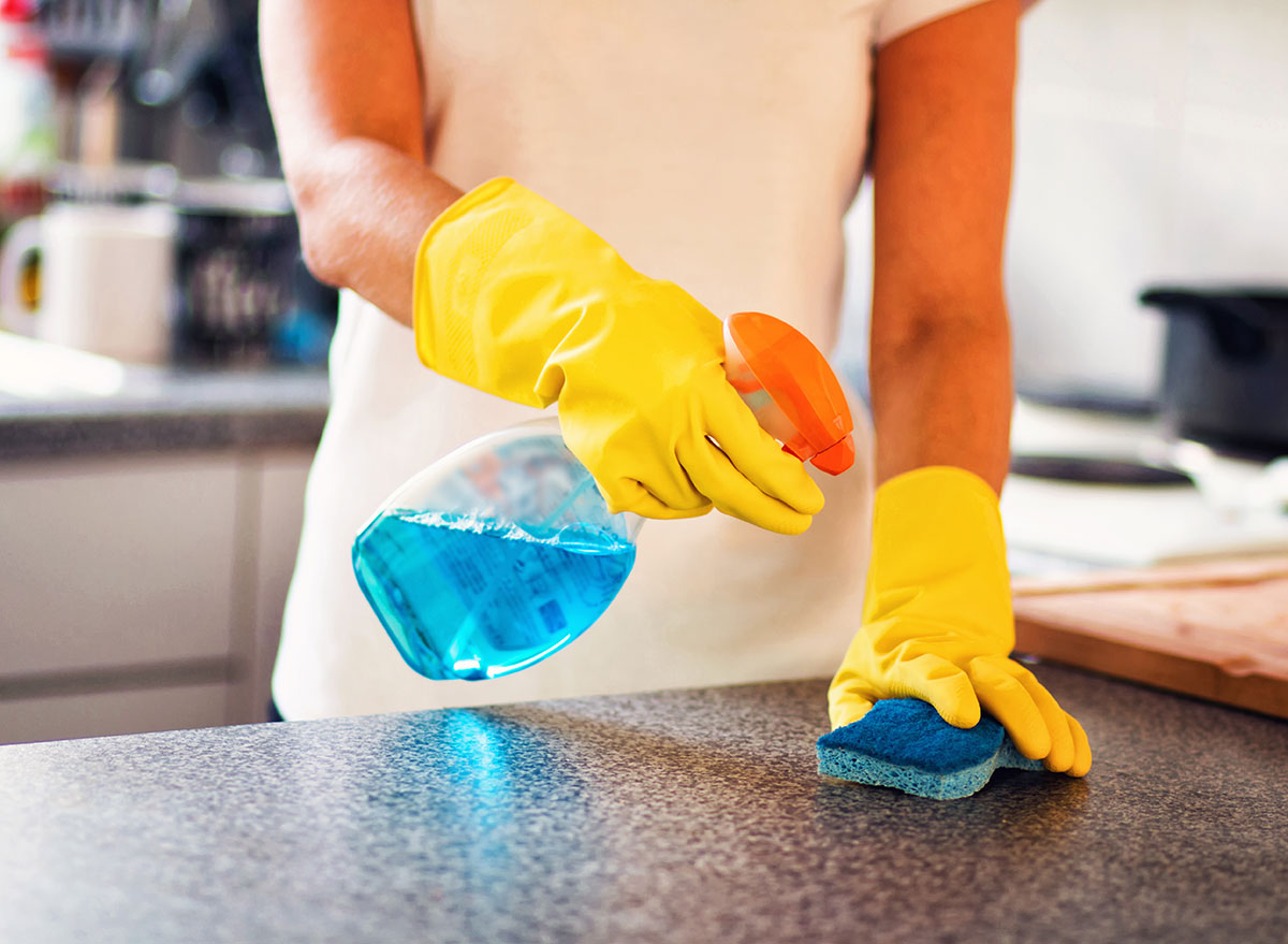 woman cleaning counter