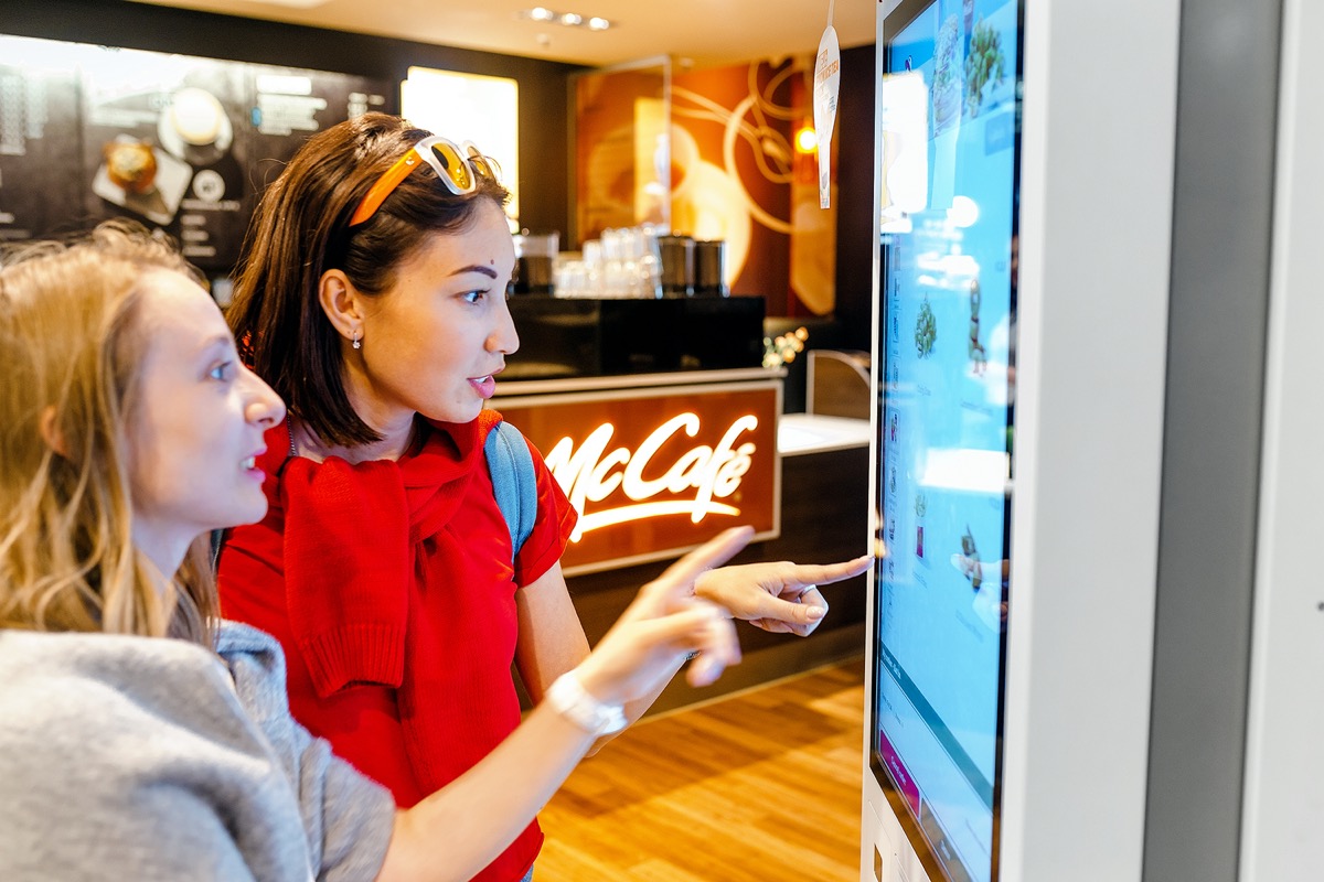 people use self service screens at McDonald's restaurant