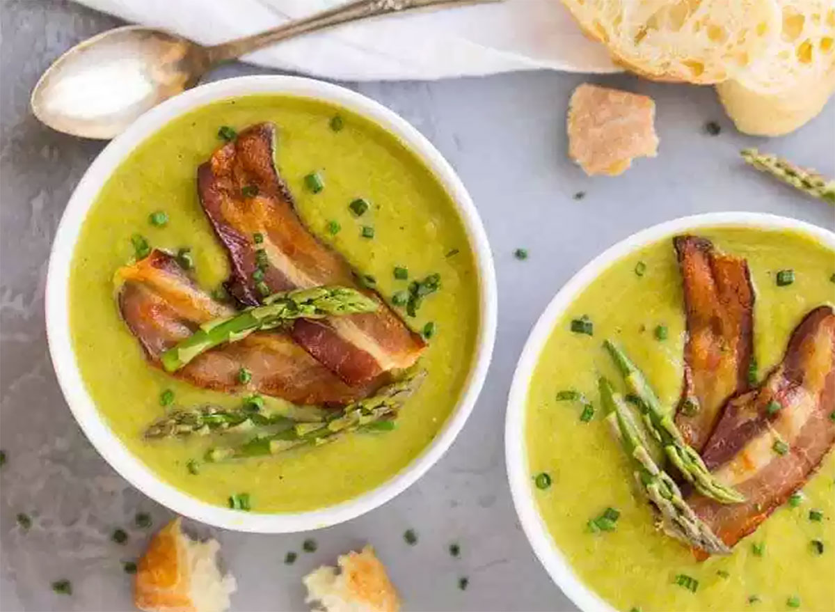 asparagus soup in bowls with bacon